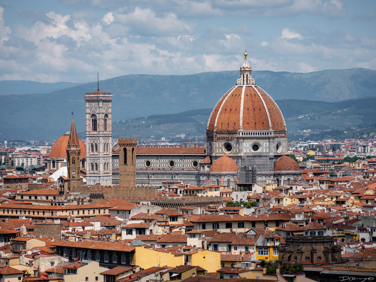 Photos from a trip through Italy in Summer of 2023. Locations include Rome, Florence, Tuscany, Castello di Bossi in Chianti, Siena, San Gimignano, Sirmione on Lake Garda, Bologna, Gudon, Italian Dolomites, Seceda, Cadini di Misurina, and Venice.